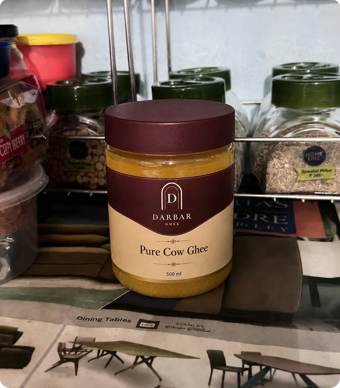 Darbar Pure Cow Ghee jar on a customer's kitchen spice rack